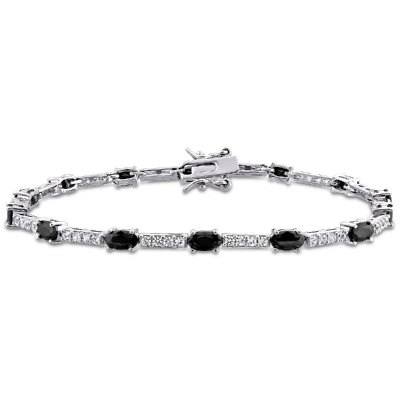 Dusk gothic bangles-Miadora 8ct TGW Black and White Cubic Zirconia Station Bracelet in Sterling Silver - 7 in