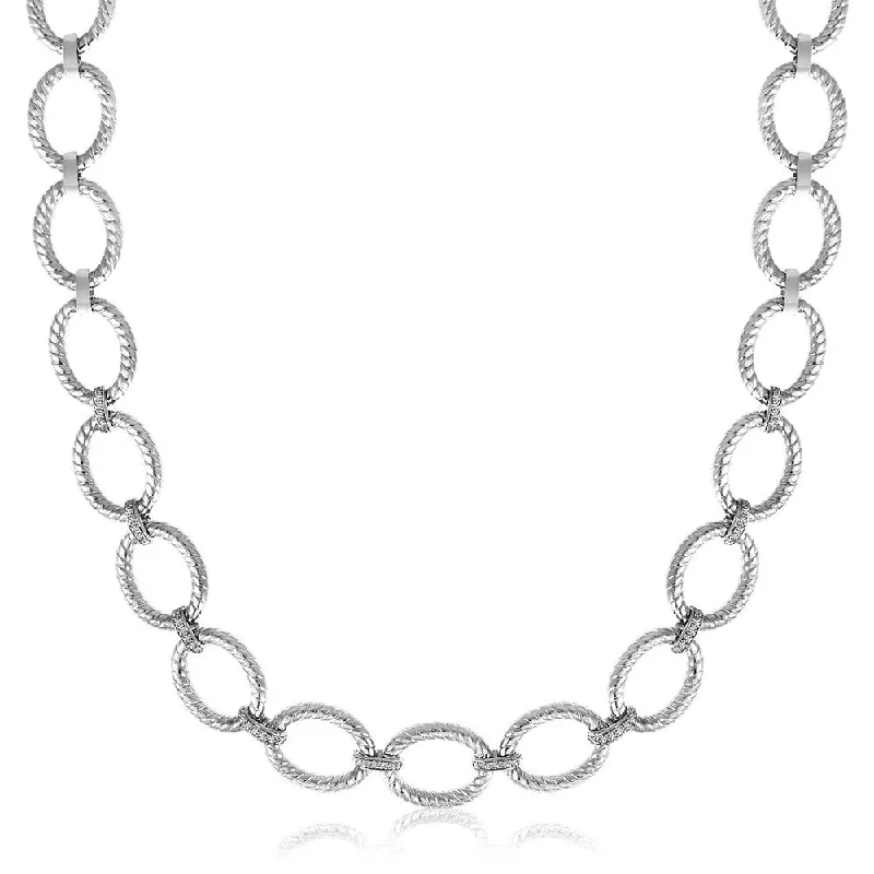 Thin filigree necklaces-Sterling Silver Rhodium Plated Diamond Accented Rope Oval Necklace (.26cttw)