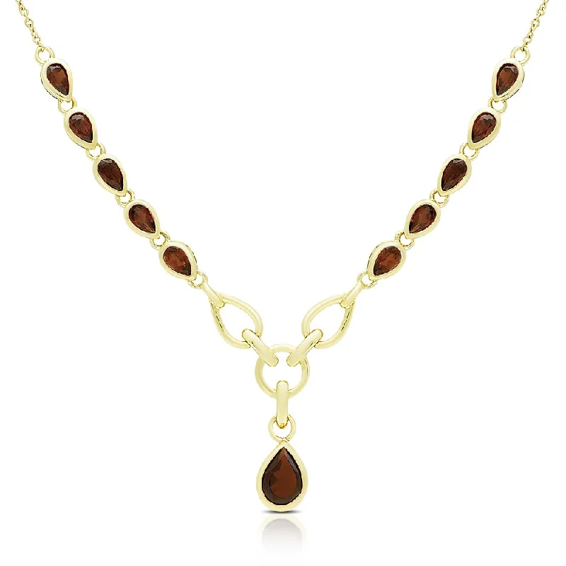 Slanted design necklaces-Dolce Giavonna Gold Over Silver Garnet Teardrop Necklace